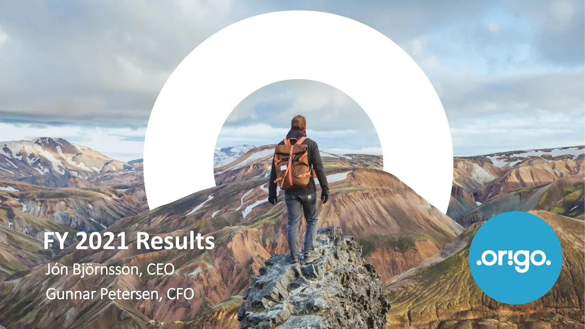 Features a person standing on a mountain peak with a large white circular graphic element.