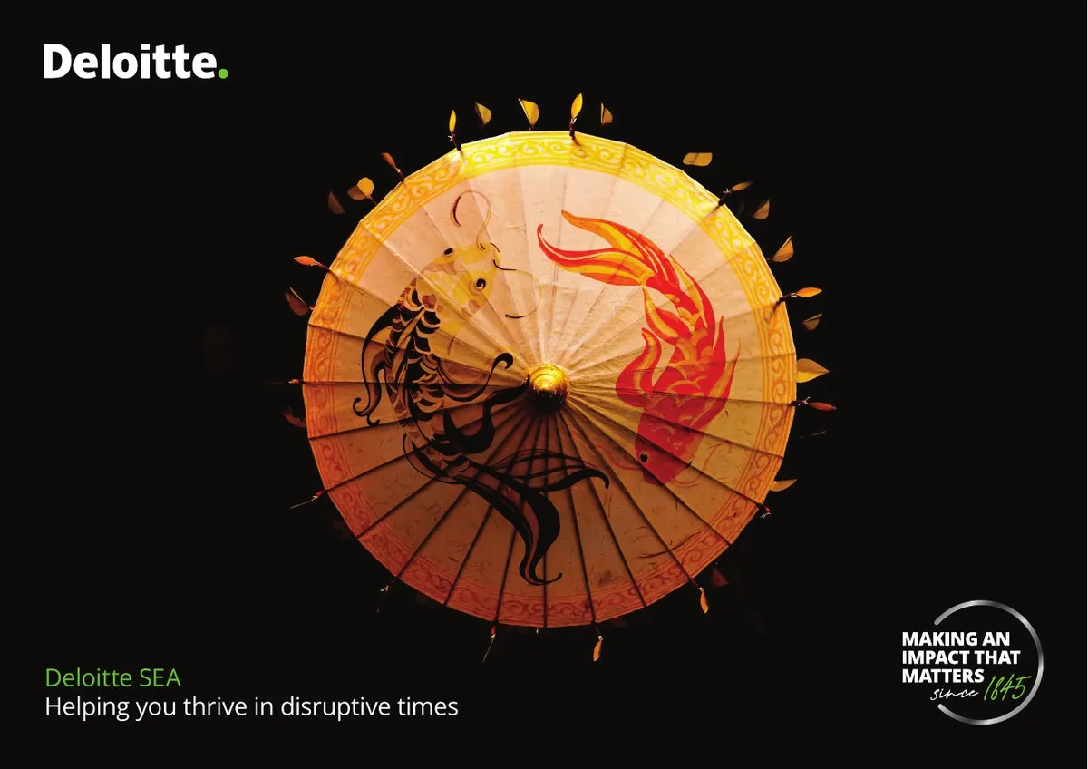 The slide uses a cultural metaphor (koi/yin-yang style) to represent balance or transformation.