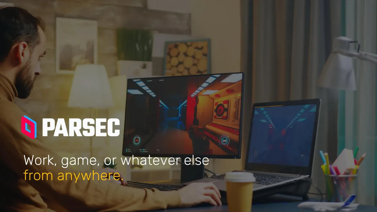 The slide uses a high-quality background image of a user at a desk to establish the product's use case.