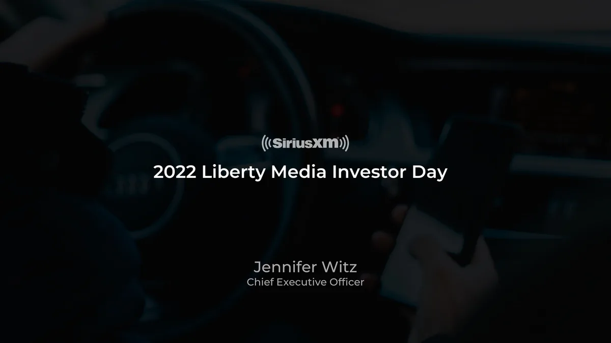 The background image shows a person in a car using a mobile device, reinforcing the automotive/mobile context of SiriusXM.