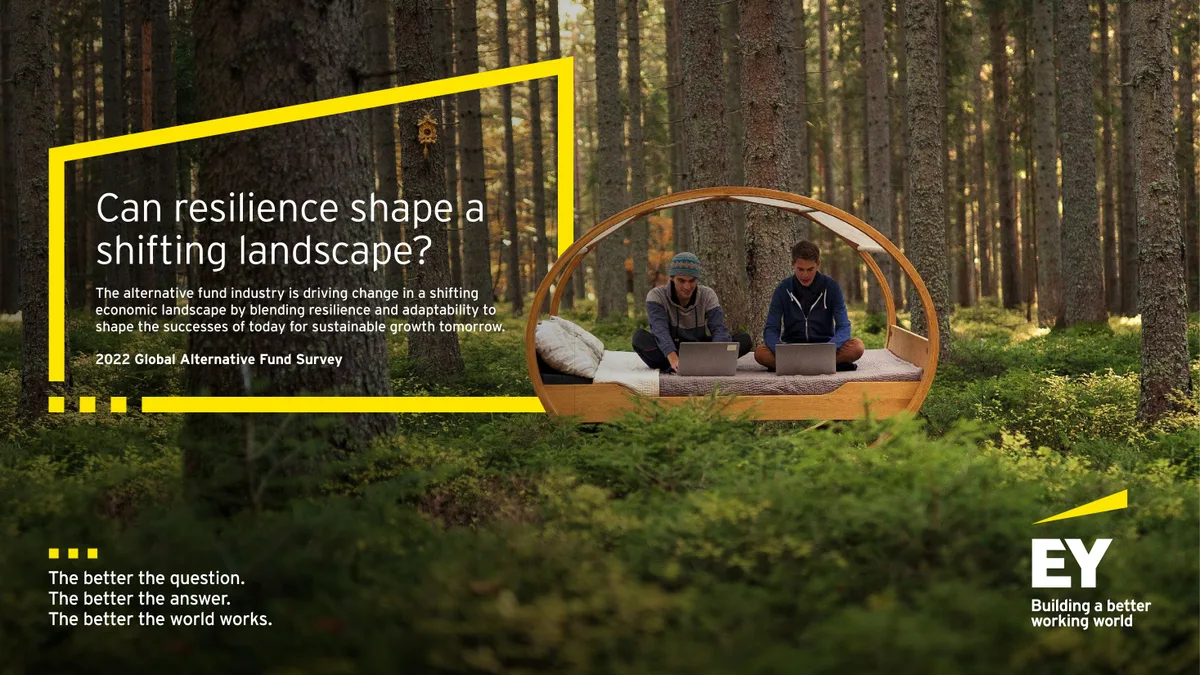 EY branding with a thematic photo of people working in a forest.