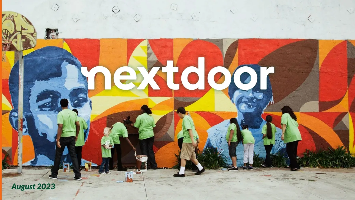 The slide features a large, prominent logo overlay on a photo of a community mural project.