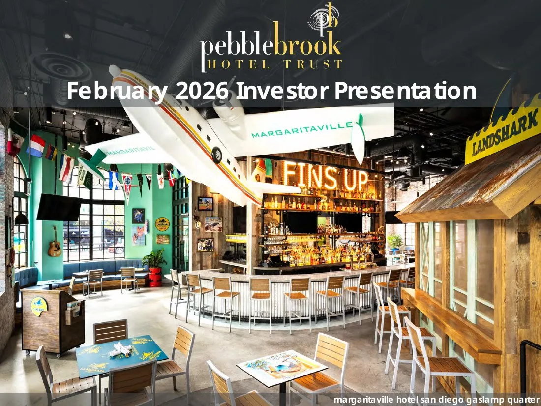 The slide features a large, high-quality photograph of a themed hotel bar/restaurant interior.