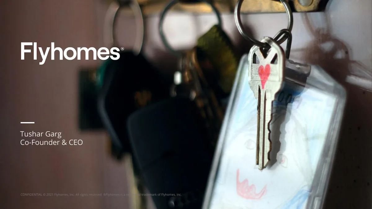 The image features a key with a heart, symbolizing home ownership.