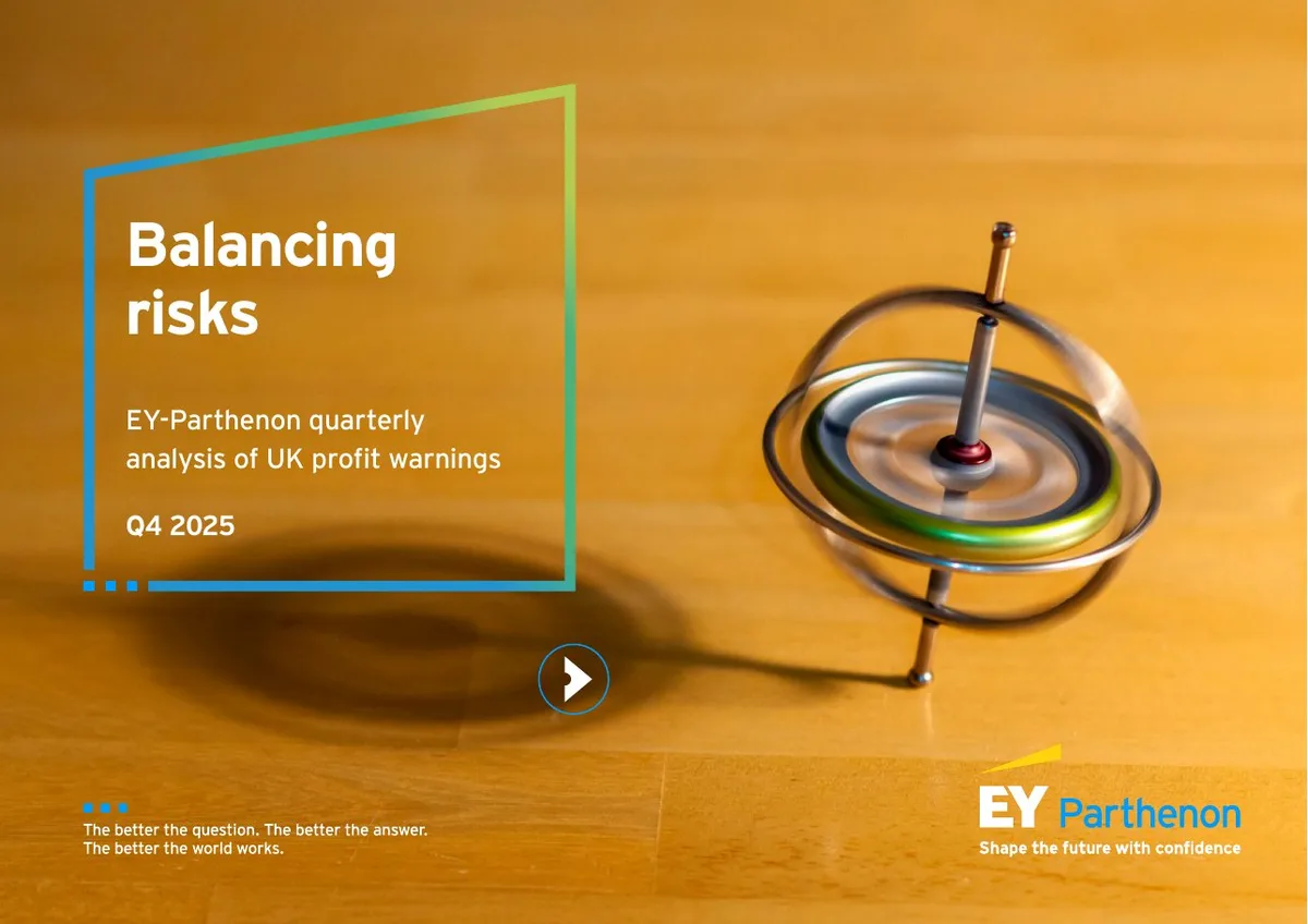 The slide uses a metaphor of a spinning top to represent 'balancing risks'.