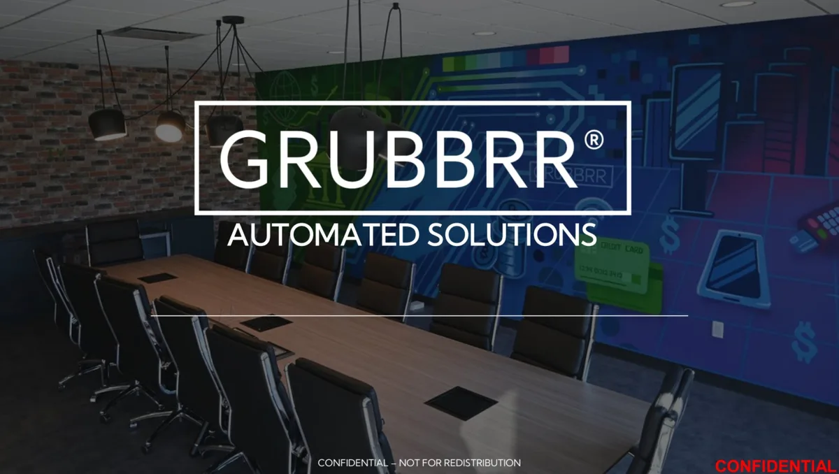 The slide features a boardroom background with a branded wall mural.