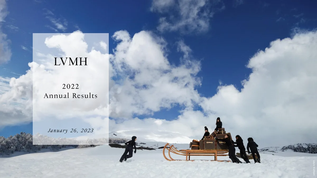 Features a Louis Vuitton branded image of a sled in a snowy landscape.